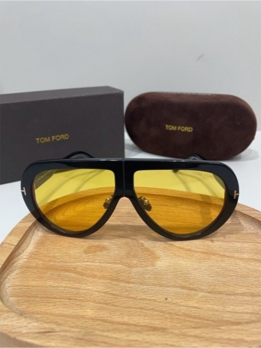 Tom Ford Women’s Black Frame Sunglasses with Yellow Lenses